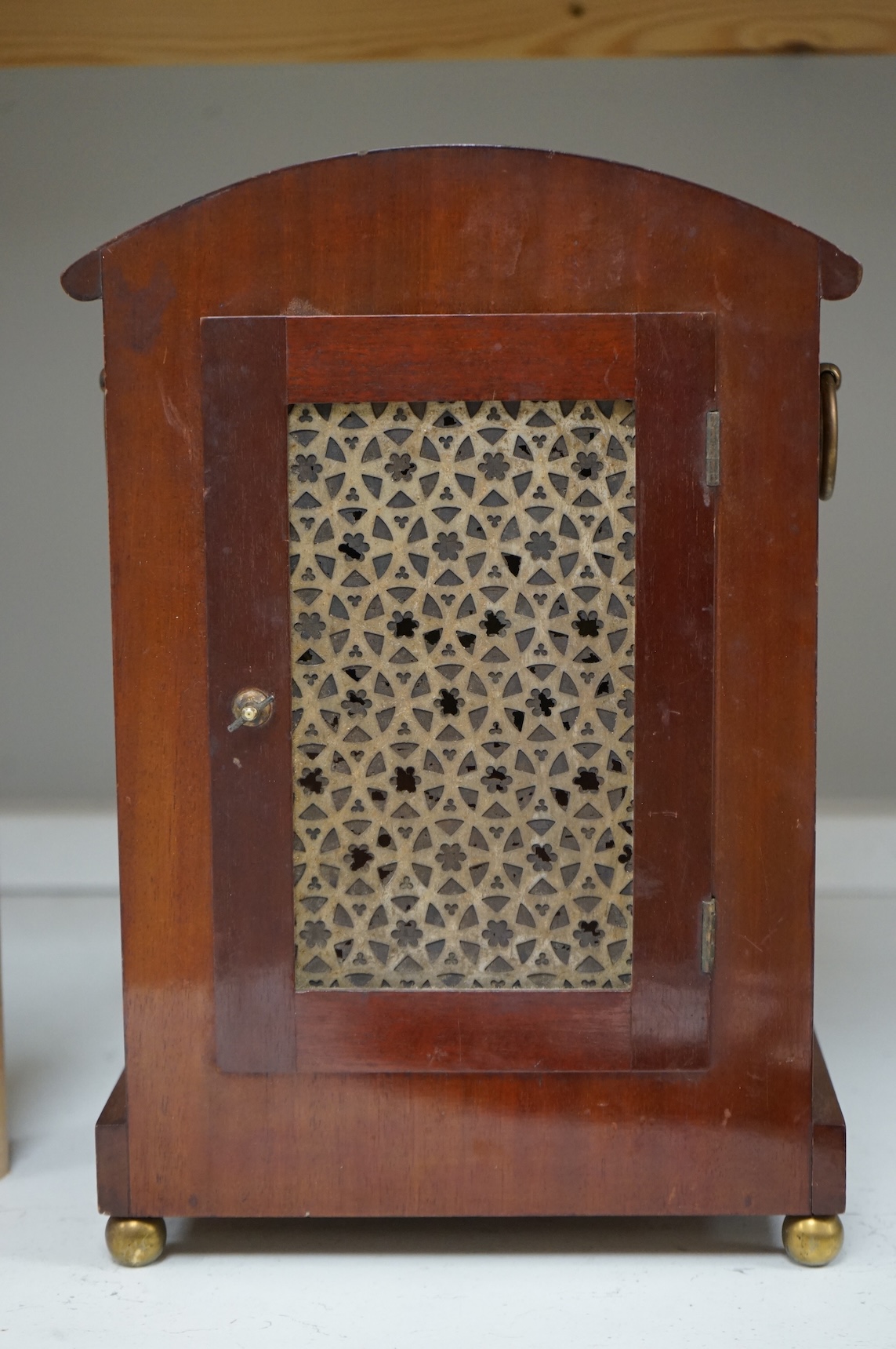 A 19th century brass inlaid mahogany mantel clock, 35cm high